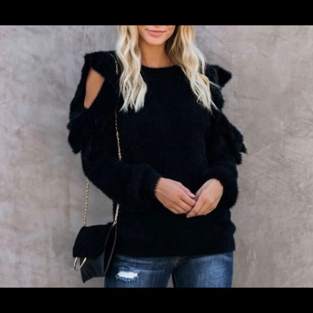 Cozy and fuzzy black ruffle cold shoulder sweater